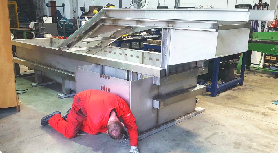 Rod making new door for a JCB