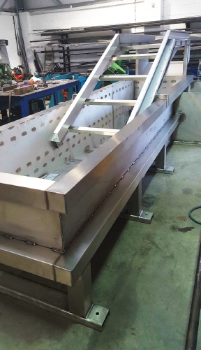 water tank and conveyor frame